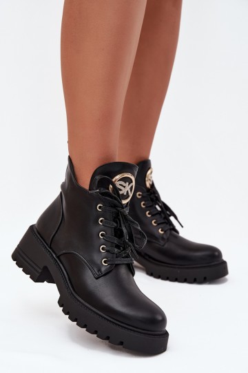 Bottines isolées pour femmes avec détails dorés en noir Kavirae