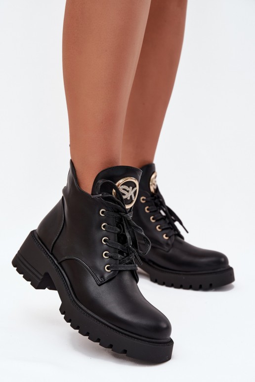 Bottines isolées pour femmes avec détails dorés en noir Kavirae