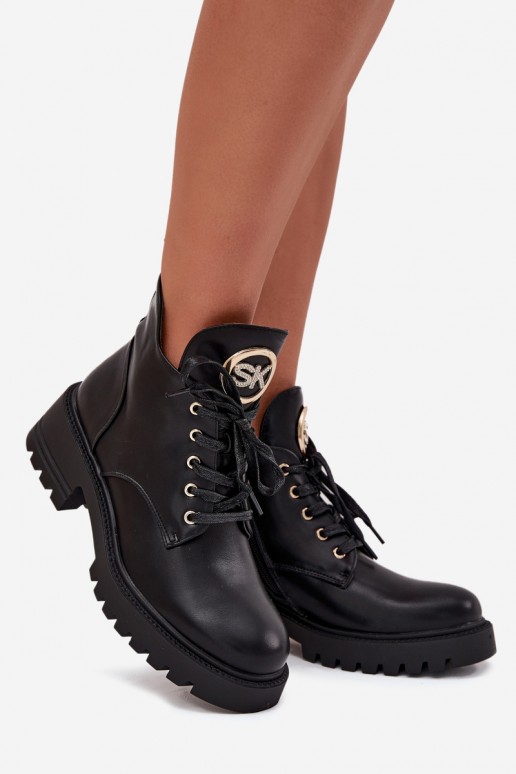 Bottines isolées pour femmes avec détails dorés en noir Kavirae