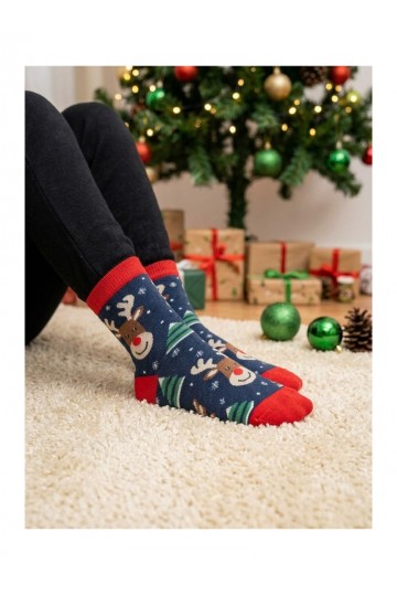 Chaussettes pour enfants avec des rennes souriants et des sapins en bleu foncé