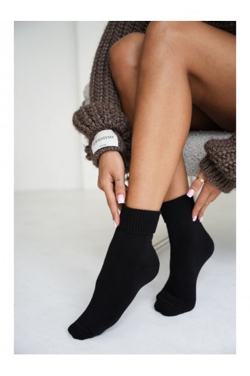 Chaussettes femme en peluche avec bords lâches en noir