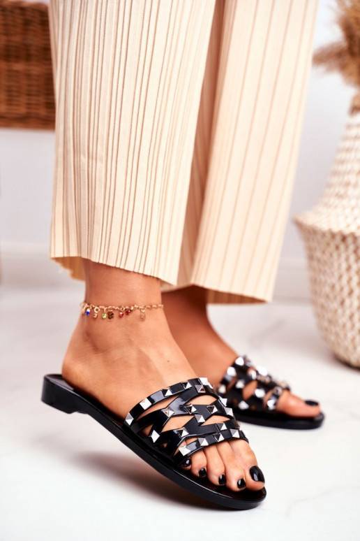 Chaussons en caoutchouc noir avec rivets Chaussons en caoutchouc noir avec rivets