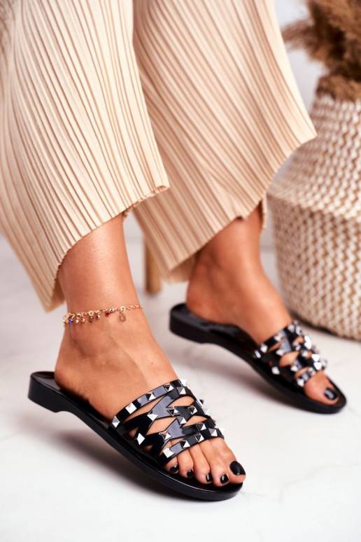 Chaussons en caoutchouc noir avec rivets Chaussons en caoutchouc noir avec rivets