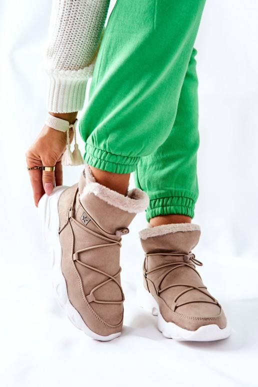 Bottes de neige chauffantes de couleur beige