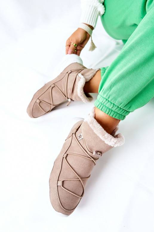 Bottes de neige chauffantes de couleur beige
