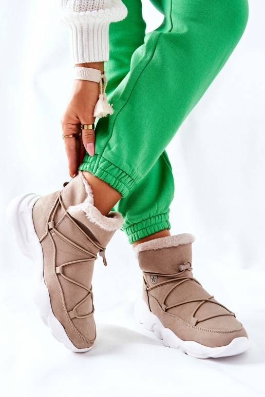 Bottes de neige chauffantes de couleur beige