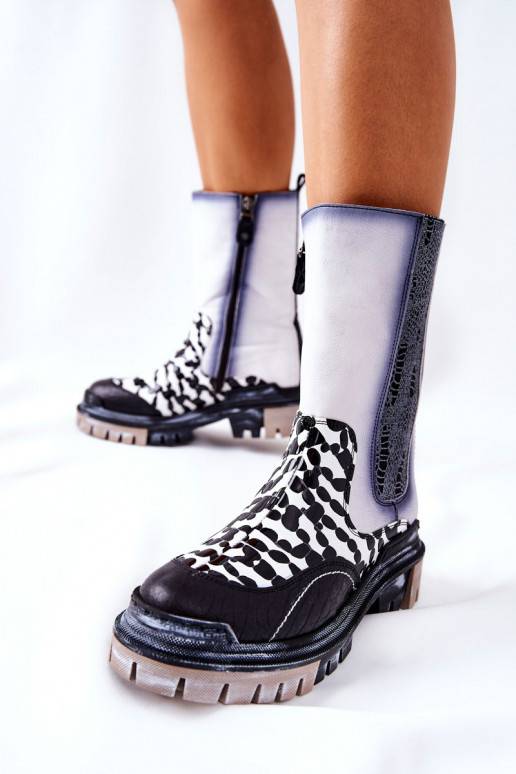 Bottes élégantes noires et blanches Bottes élégantes noires et blanches