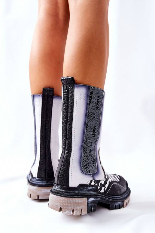 Bottes élégantes noires et blanches Bottes élégantes noires et blanches