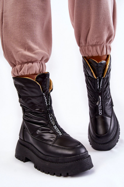 Bottes de neige noires avec... Bottes de neige noires avec...