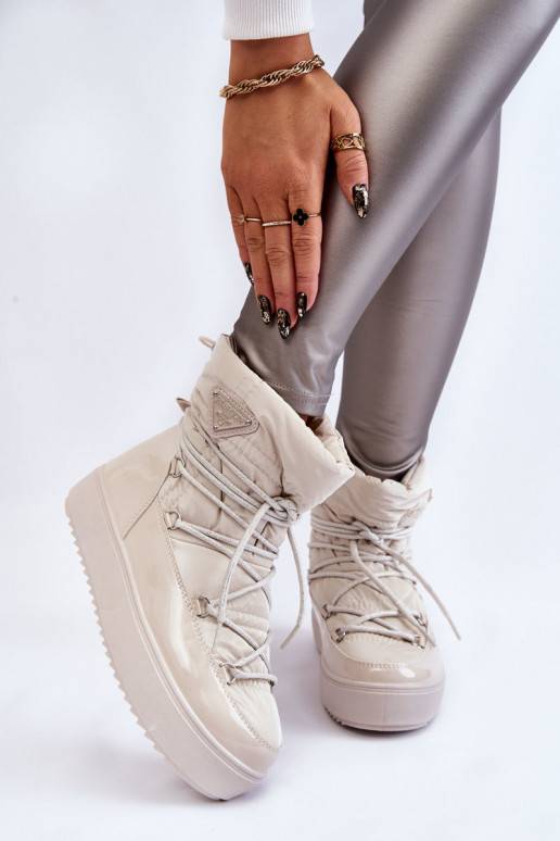 Bottes de neige chauffantes à lacets... Bottes de neige chauffantes à lacets...