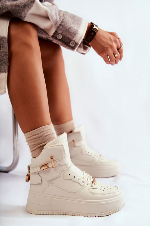 Chaussures de sport chauffantes beige... Chaussures de sport chauffantes beige...