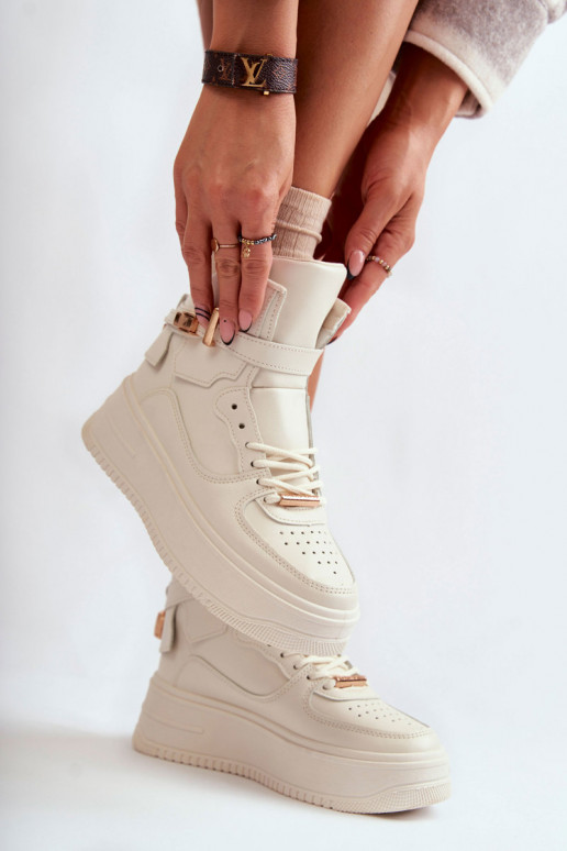 Chaussures de sport chauffantes beige... Chaussures de sport chauffantes beige...