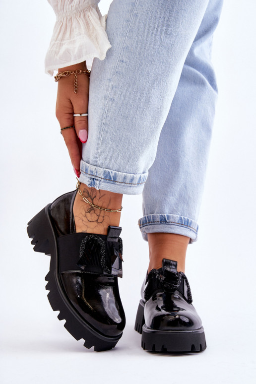 Chaussures en effet laqué noir avec...