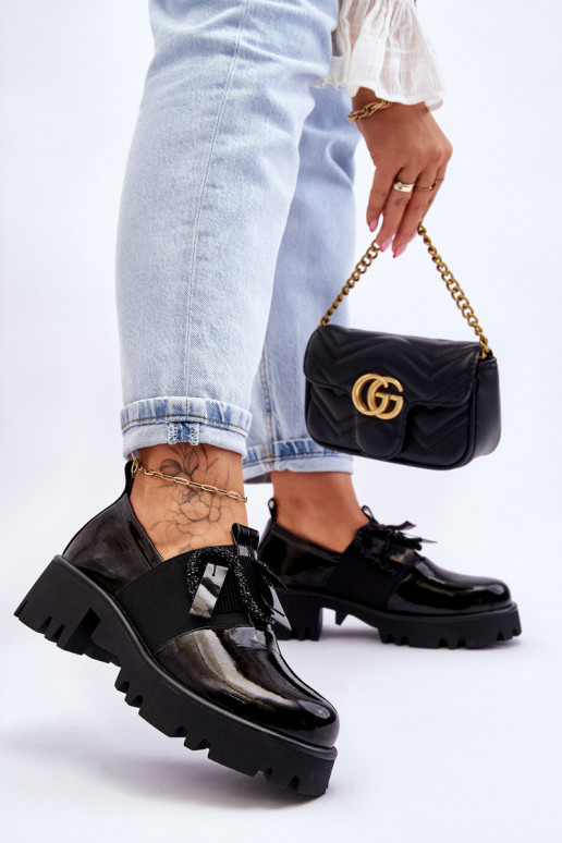 Chaussures en effet laqué noir avec...