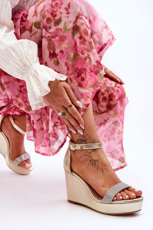 Sandales dorées Arwen avec plateforme Sandales dorées Arwen avec plateforme