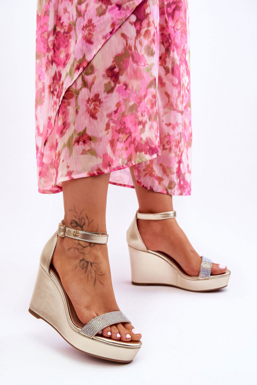 Sandales dorées Arwen avec plateforme Sandales dorées Arwen avec plateforme