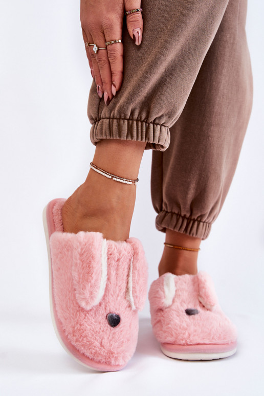 Tongs avec fourrure Remmi dans une teinte rose clair
