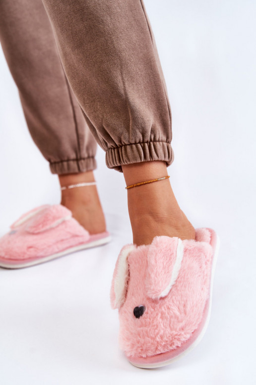 Tongs avec fourrure Remmi dans une teinte rose clair