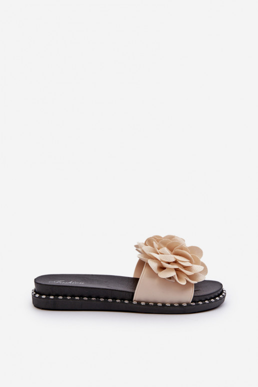 Tongs femme à motifs floraux beige... Tongs femme à motifs floraux beige...