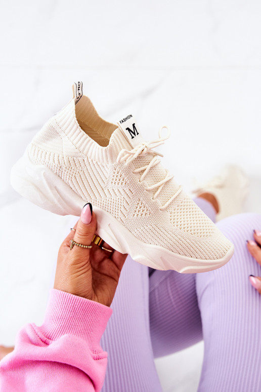 Chaussures modèle baskets en matière couleur ivoire Nolene