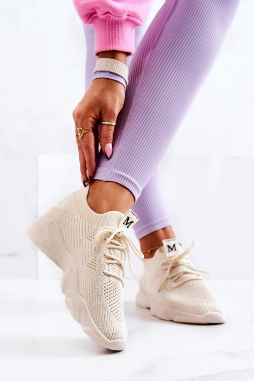 Chaussures modèle baskets en matière couleur ivoire Nolene