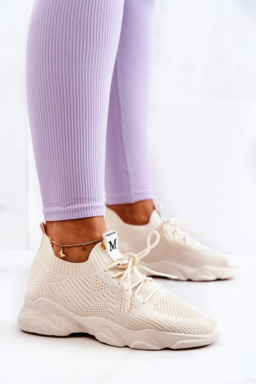 Chaussures modèle baskets en matière couleur ivoire Nolene