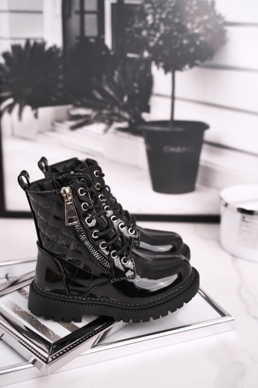 Boots femme laquées noires