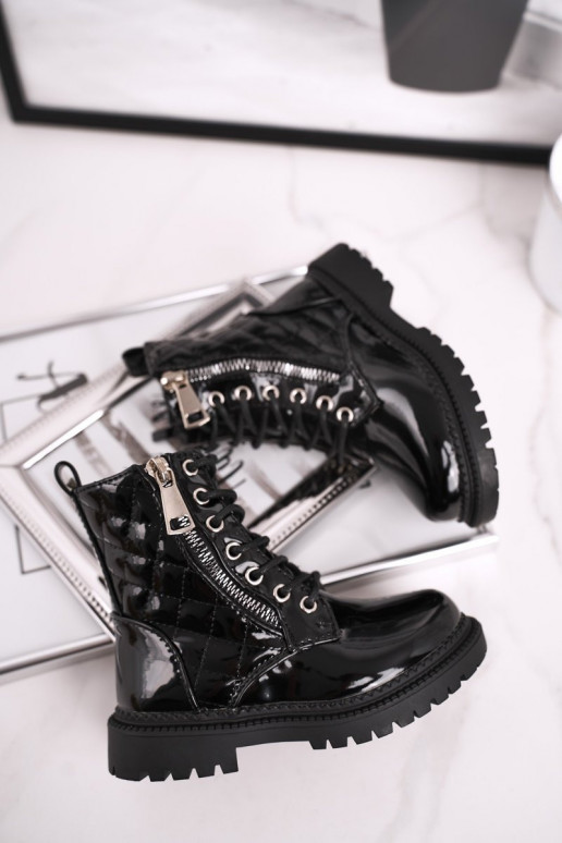 Boots femme laquées noires