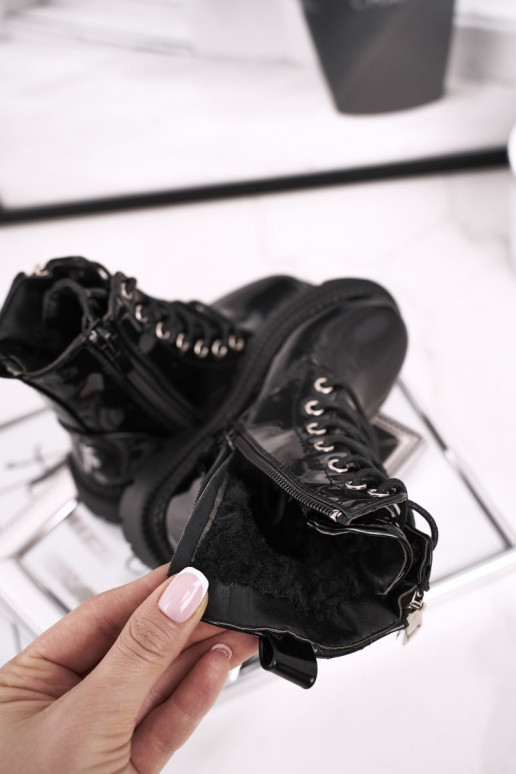 Boots femme laquées noires