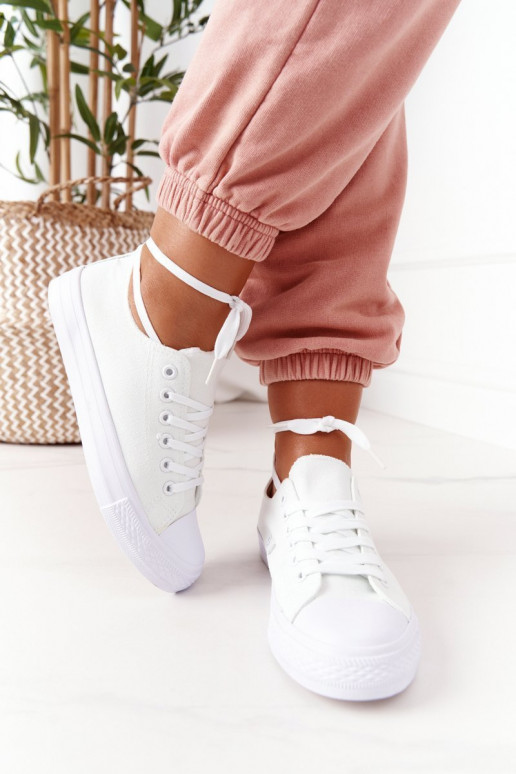 Chaussures décontractées modèle classique de couleur blanche