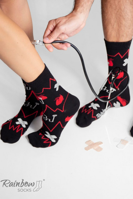 3 paires de chaussettes colorées dans une boîte