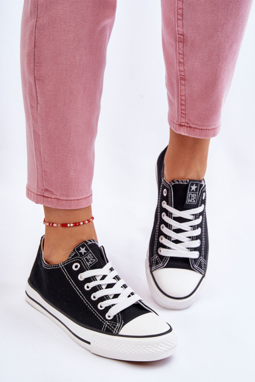 Chaussures de loisirs modèle classique de couleur noire avec semelles blanches Ecoma