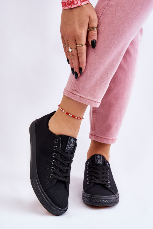 avec lanières Chaussures de loisirs modèle Classique de couleur noire Eleya