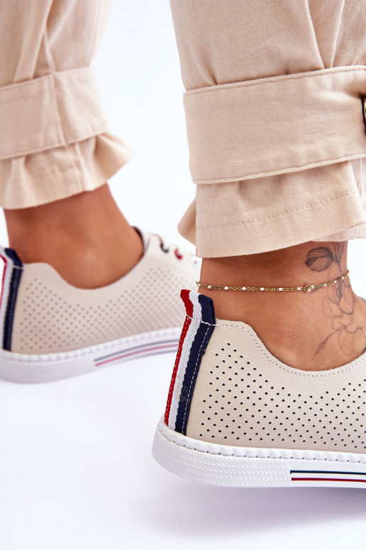 avec des éléments ajourés chaussures décontractées couleur beige Ferone