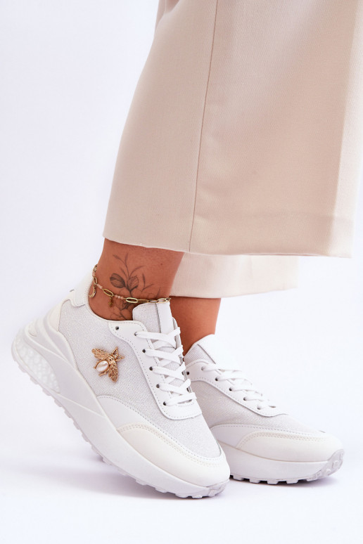 Chaussures de sport brillantes avec ornements de couleur blanche Seneca