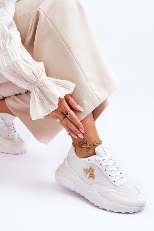 Chaussures de sport brillantes avec ornements de couleur blanche Seneca