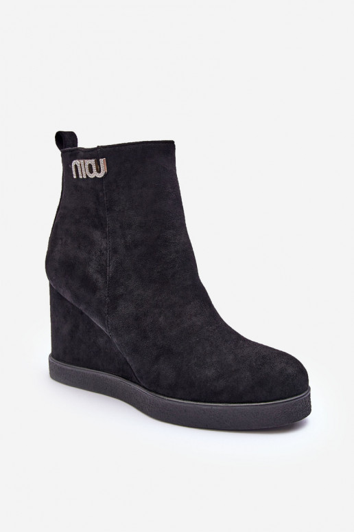 Bottines chauffantes en daim avec ornements de couleur noire Vere Bottines chauffantes en daim avec ornements de couleur noire Vere