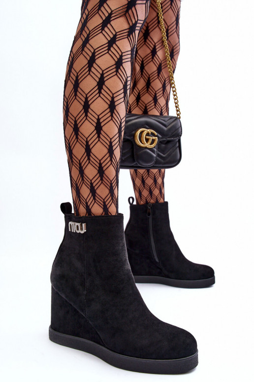 Bottines chauffantes en daim avec ornements de couleur noire Vere Bottines chauffantes en daim avec ornements de couleur noire Vere