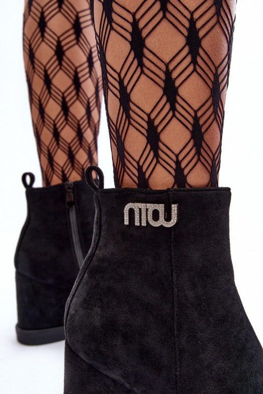 Bottines chauffantes en daim avec ornements de couleur noire Vere Bottines chauffantes en daim avec ornements de couleur noire Vere