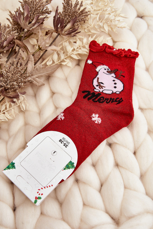 Chaussettes de Noël brillantes avec bonhommes de neige en rouge