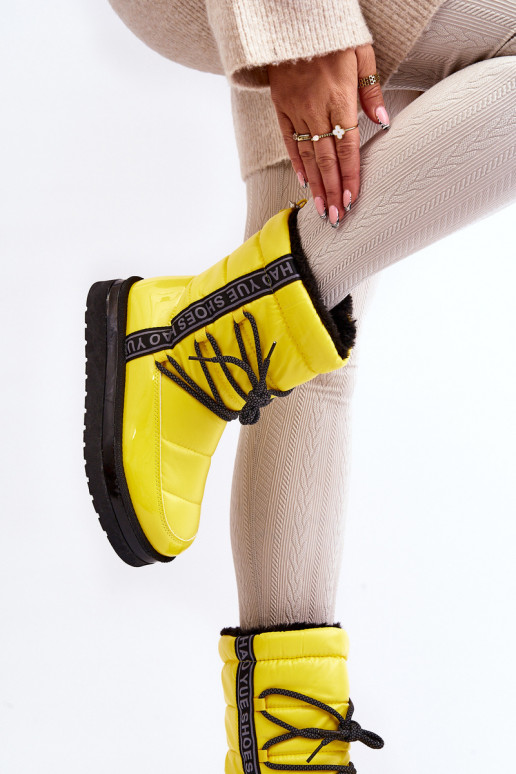 bottes de neige avec détails élégants en jaune Lilara bottes de neige avec détails élégants en jaune Lilara