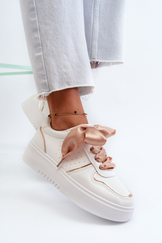 Chaussures baskets modèle à plateforme de couleur blanche Tessama