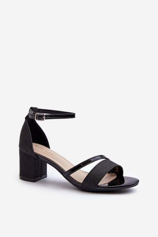 Sandales brillantes à talons bas de couleur noire Ploemis