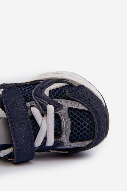 Chaussures de sport pour enfants, modèle baskets avec attaches adhésives de couleur bleu foncé Rulagia