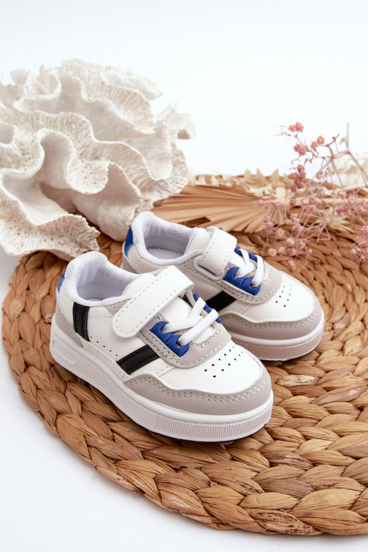 Chaussures de sport pour enfants du modèle classique de couleur blanc-bleu Marlin Chaussures de sport pour enfants du modèle classique de couleur blanc-bleu Marlin