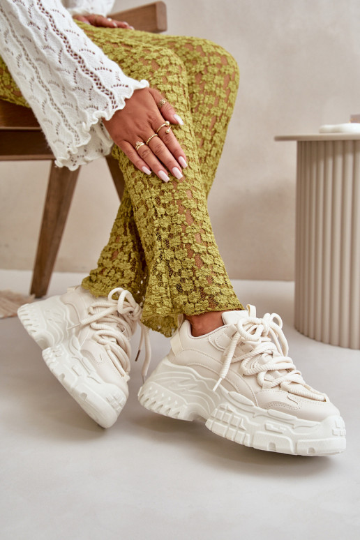 Baskets modèle chaussures femme à semelles massives à la mode de couleur ivoire Nevela Baskets modèle chaussures femme à semelles massives à la mode de couleur ivoire Nevela