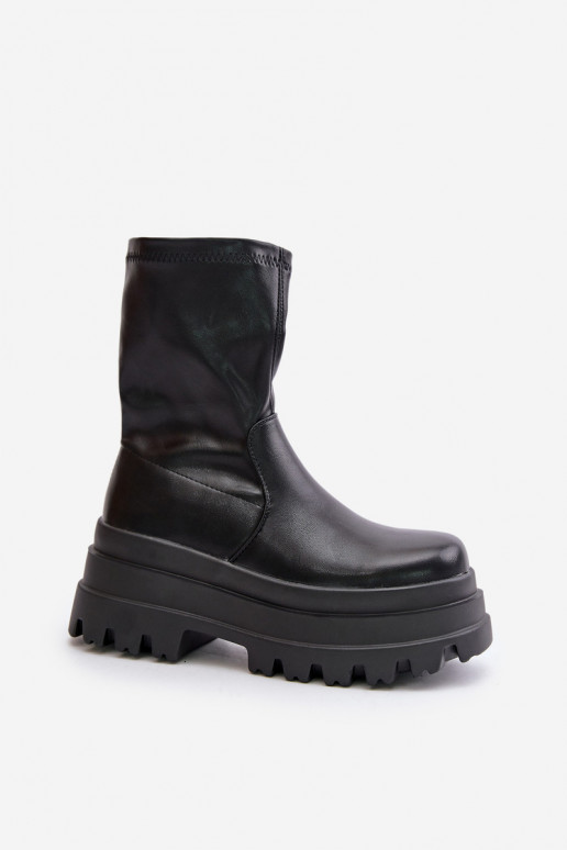 Bottes avec une plateforme couleur noire Florinara Bottes avec une plateforme couleur noire Florinara