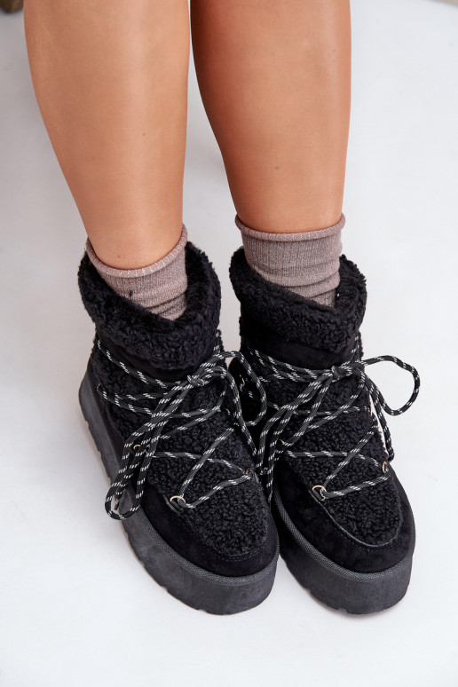 Bottes de neige avec une plateforme et des détails élégants couleur noire Izathiel Bottes de neige avec une plateforme et des détails élégants couleur noire Izathiel
