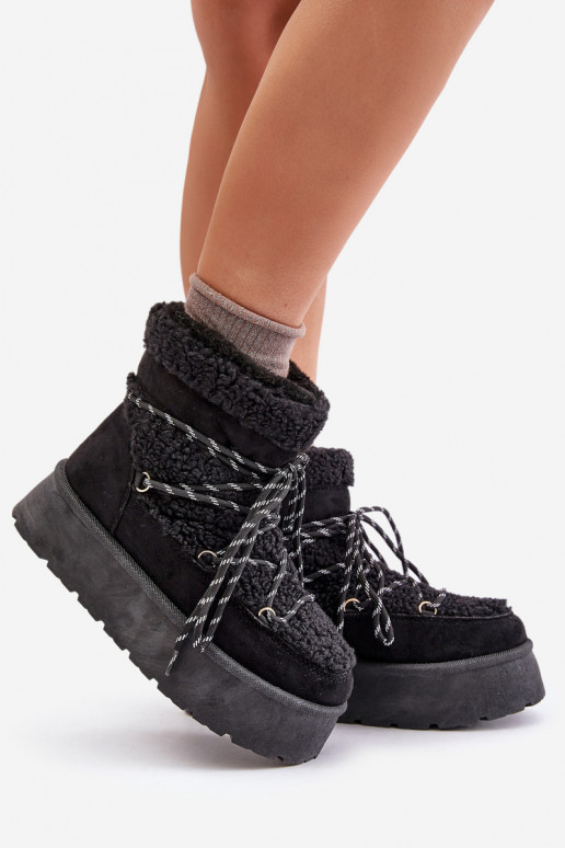 Bottes de neige avec une plateforme et des détails élégants couleur noire Izathiel Bottes de neige avec une plateforme et des détails élégants couleur noire Izathiel