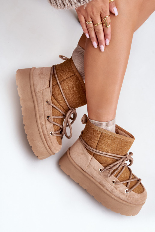 Bottes de neige avec des détails élégants avec une plateforme marron Il fautvora Bottes de neige avec des détails élégants avec une plateforme marron Il fautvora